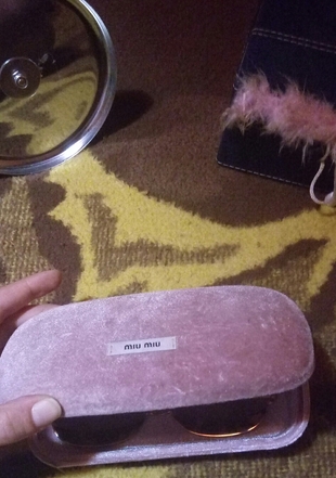 miu miu güneş gözlüğü