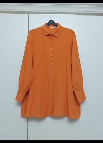 Defakto tunik