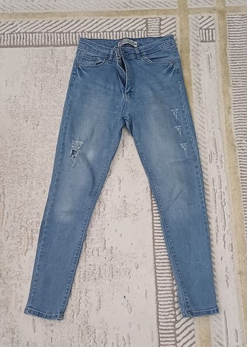 Mavi Yırtık Detaylı Kadın Denim Jean