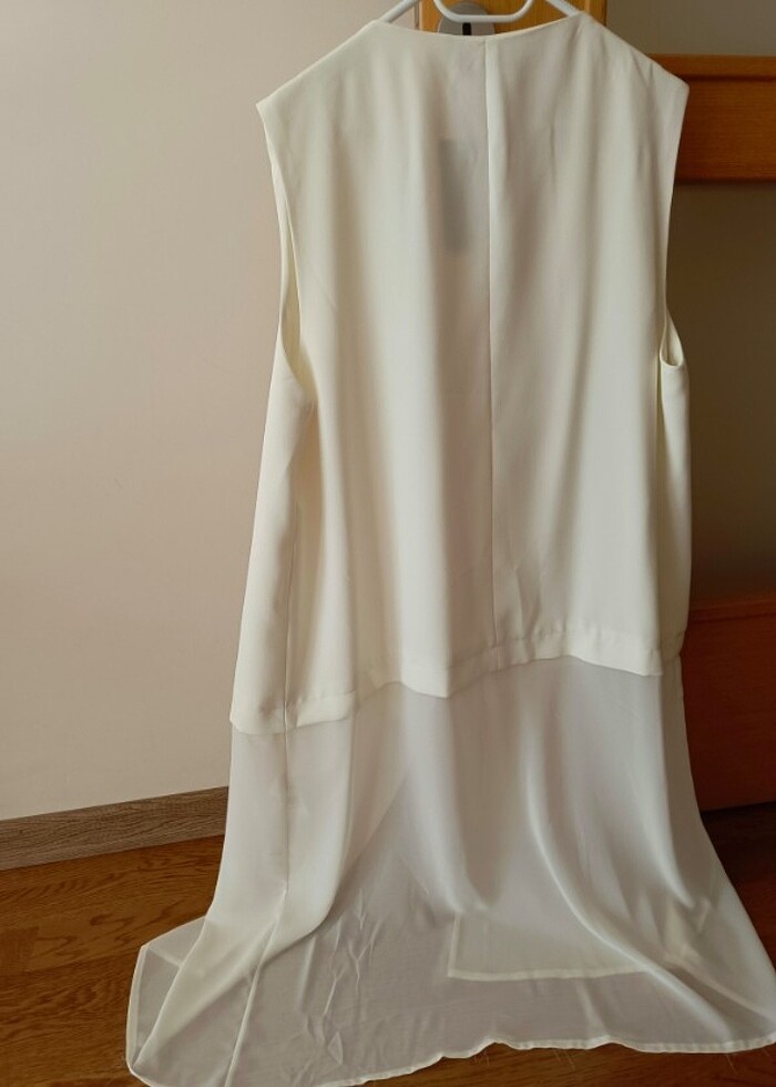 Beyaz yelek  - Görsel 3