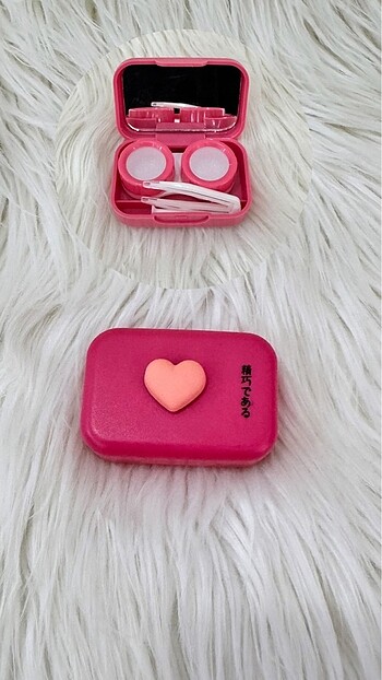 Pembe lens kutusu