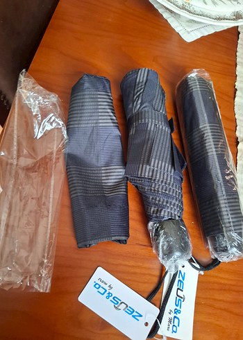 Kadin şemsiye etiketli boynerden alınmıştır - Görsel 5