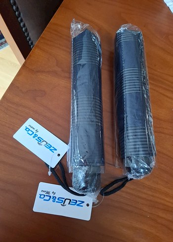 Kadin şemsiye etiketli boynerden alınmıştır - Görsel 2