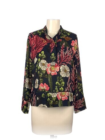 H&M Bluz %70 İndirimli.