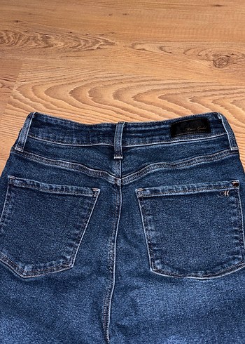 Koyu mavi dar kesim likralı kumaş kadın jean - Görsel 2