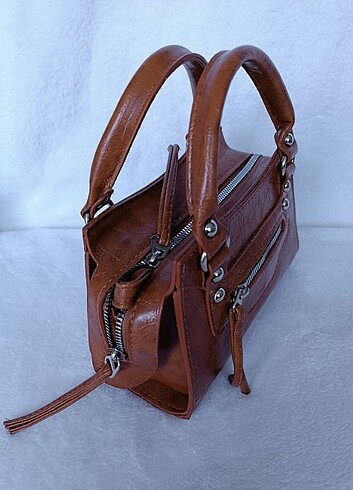 Manuka model kol çantası 