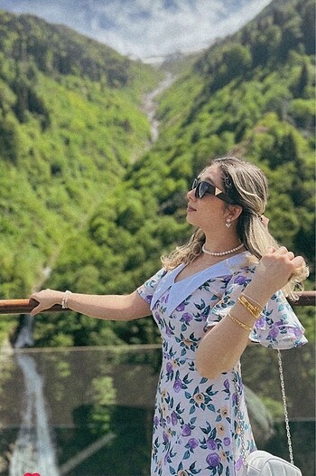 Mor çiçekli bebe yaka elbise