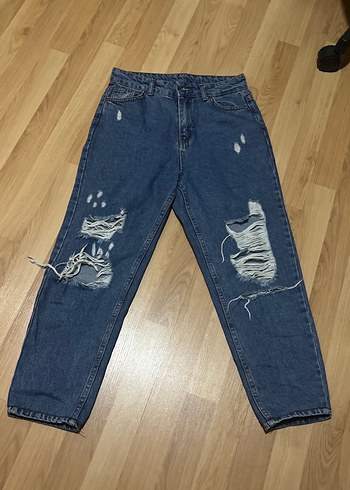 Mavi Yırtık Detaylı Kadın Kot Pantolon