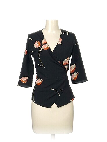 Zara Bluz %70 İndirimli.