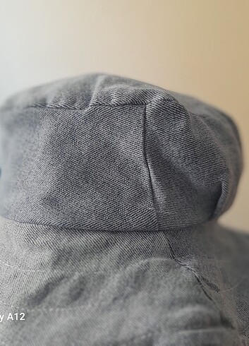 Elde yapılmış kot bucket şapka.
