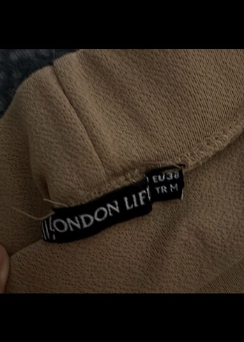 Kadın Bej Bol Kesim Pilili Kumaş Pantolon - Görsel 3