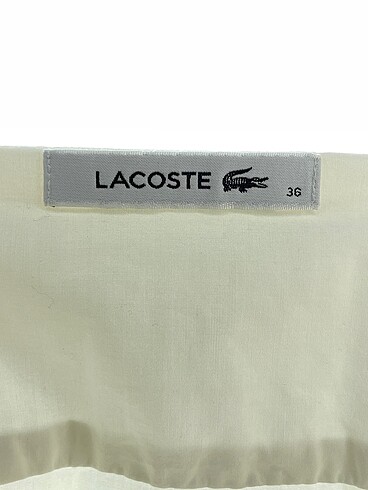 36 Beden beyaz Renk Lacoste Gömlek %70 İndirimli.