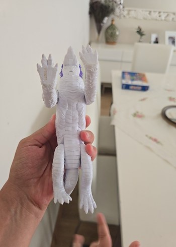 Beden Beyaz ve Mor Dinozor Aksiyon Figürü
