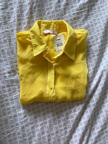 sarı tül gömlek