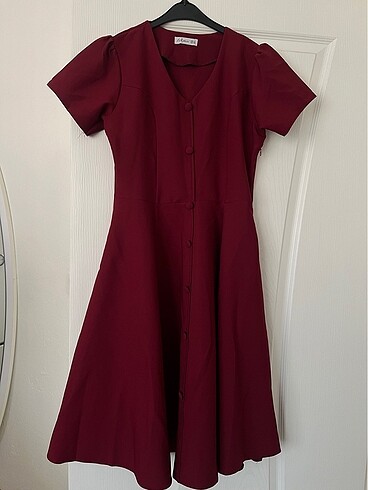 Kiloş bordo elbise