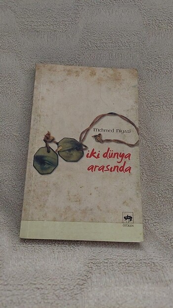 İki dünya arasında Romanı Mehmet Niyazi 