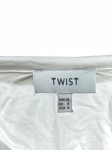 36 Beden beyaz Renk Twist Gömlek %70 İndirimli.