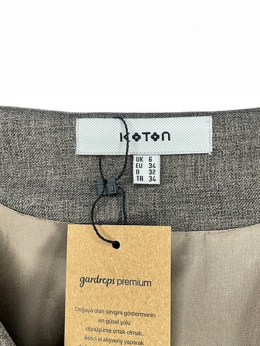 34 Beden kahverengi Renk Koton Blazer %70 İndirimli.