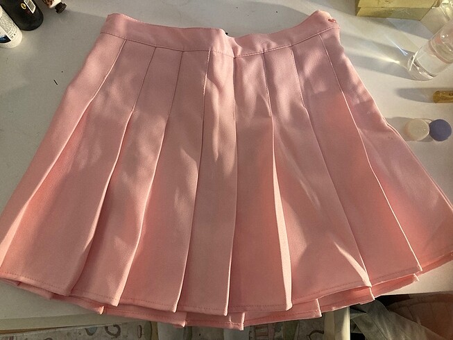Pembe pileli etek