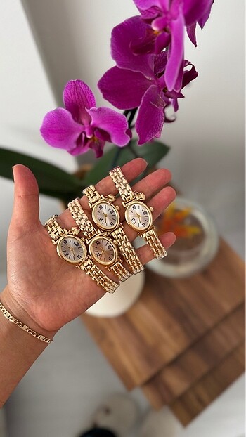 Gold charm kadın kol saat