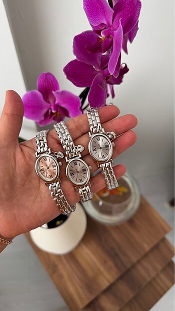 Gümüş renk charm seri kadın saat