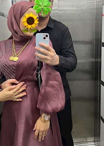 38 Beden Uzun KolluDrapeli Tesettür Abiye renk kiremit gibi, değişkendir