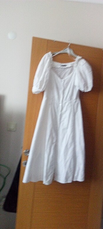Yazlık küpürlü beyaz elbise