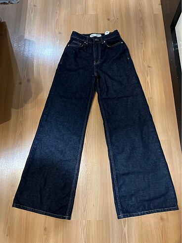 34 beden geniş kesim lacivert renk ihraç fazlası kot pantolon ??