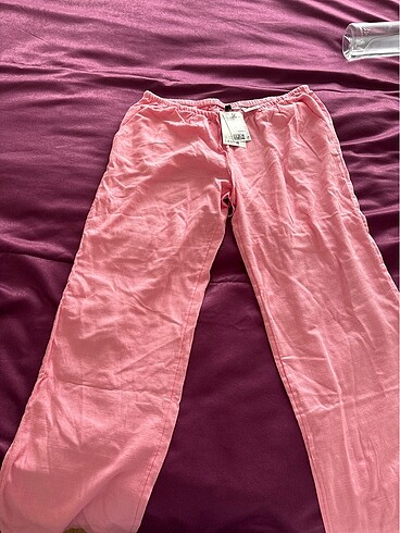 Pembe keten pantolon