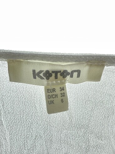 34 Beden beyaz Renk Koton Bluz %70 İndirimli.