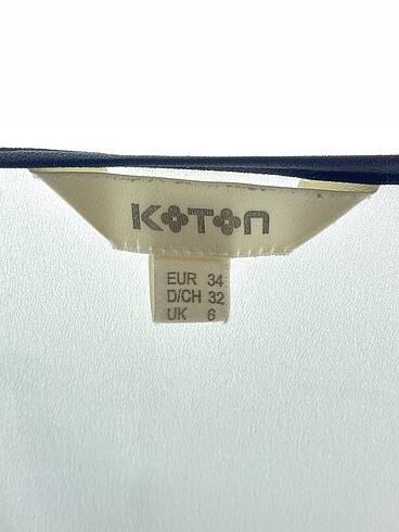 34 Beden beyaz Renk Koton Bluz %70 İndirimli.