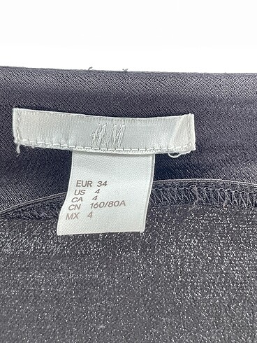 34 Beden siyah Renk H&M Kısa Elbise %70 İndirimli.