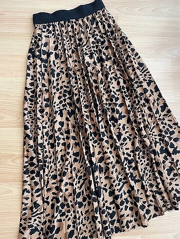 Pileli etek leopar