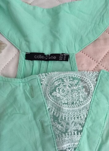 36 Beden turkuaz Renk Collezione s beden su yeşili bluz az bir iki kullanıldı yırtık