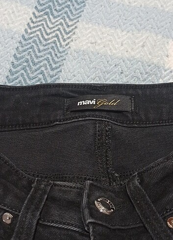 26/28 Mavi Jeans Maria Duman Gri paçası kesik Jean. 